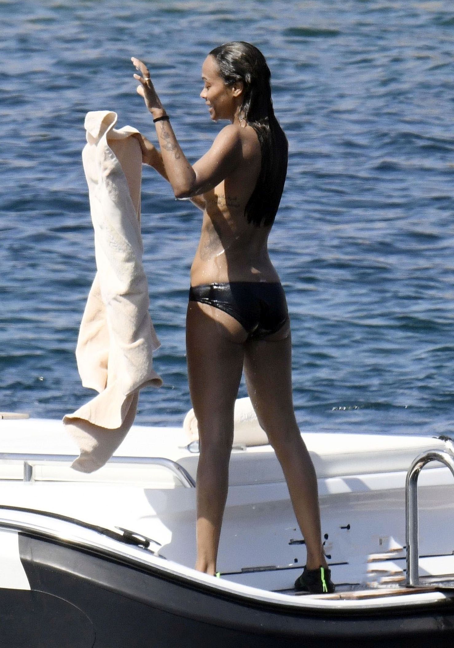 Zoe Saldana Goes Topless on a Boat.